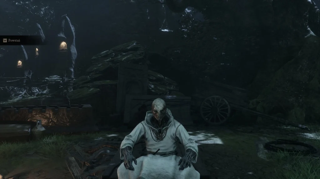 Mroczna, wyniszczona postać gracza w Mortal Shell II, wyglądająca jak niepokojąca powłoka z brutalnego świata dark fantasy.